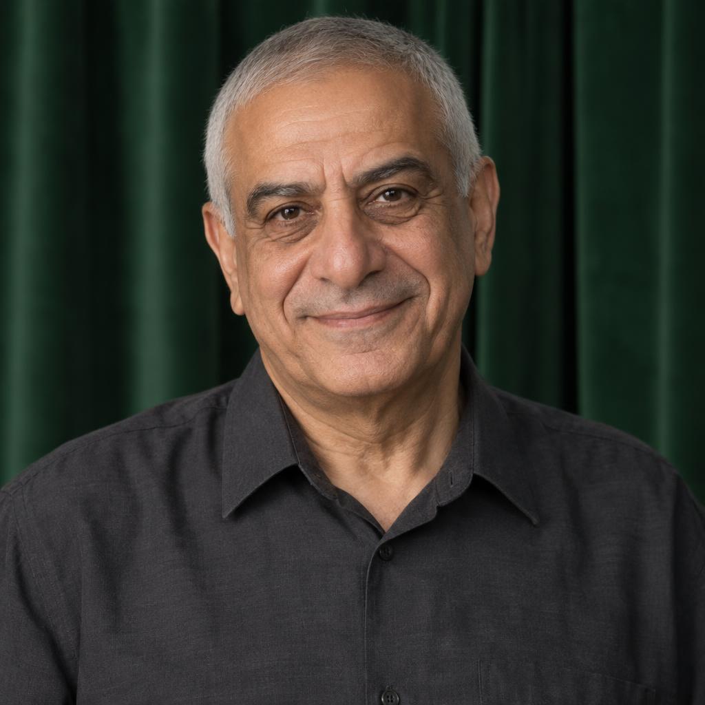 Musical-Theater Presence: Chest-up acting headshot against a rich forest-green theater curtain.